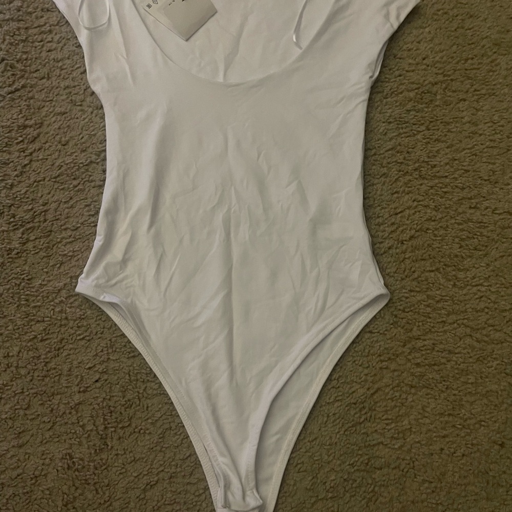 White Scoop Neck Bodysuit. Never Worn!